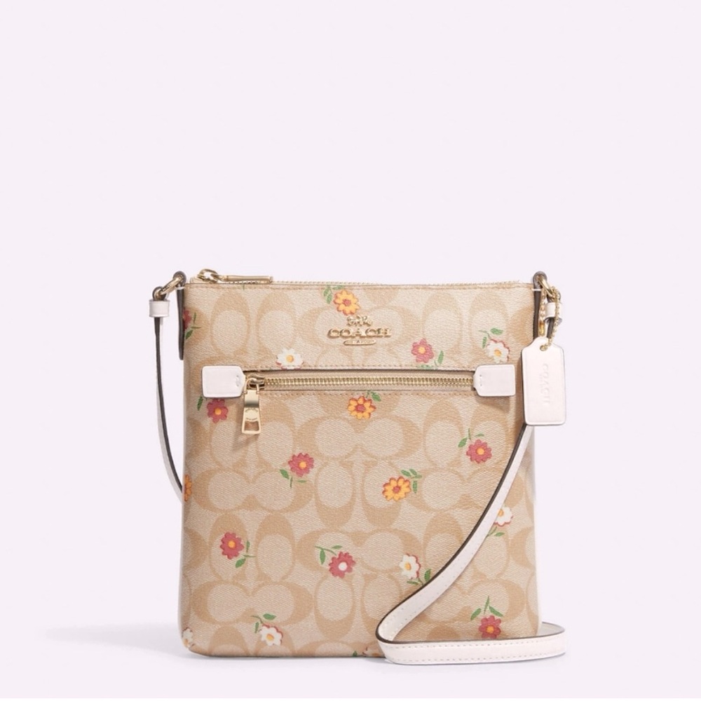Brand New Coach Mini Rowan File Bag In Signature Canvas With Daisy Print.
